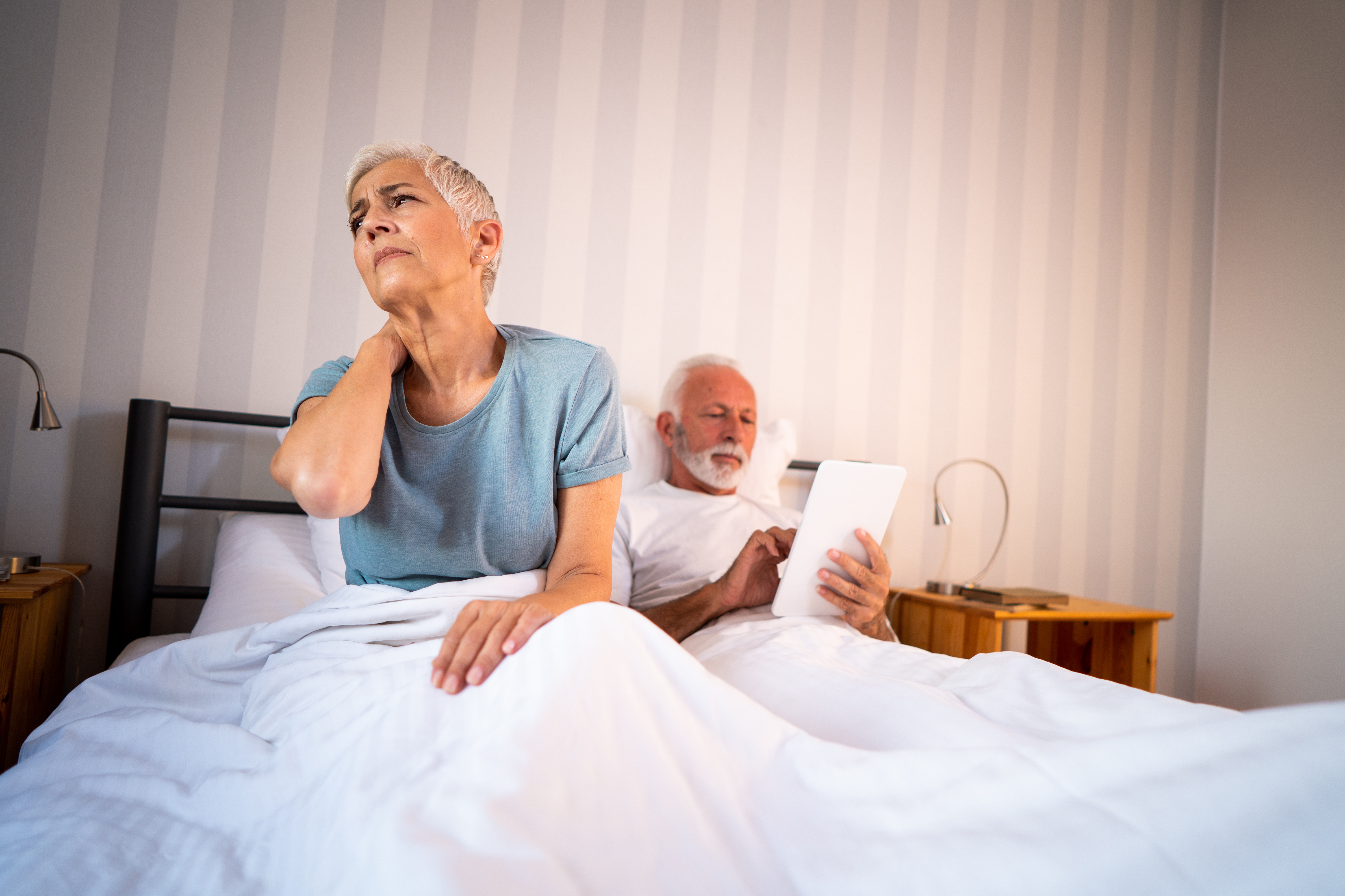 Woman with neck pain from sleeping 